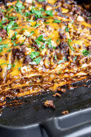 Use this recipe to make a flavorful burrito casserole, made with ground beef, cheddar cheese, burrito seasoning, refried beans, and tortillas. Beef Enchilada Casserole Home Made Interest