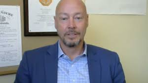 Former superintendent reaches settlement with Douglas County schools