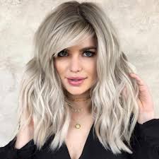 For this hairstyle cut your hair near the crown into few layers, and then cut the rest of hair into deep layers, and style them by flipping the hair ends outwards. The Top 20 Flattering Side Bangs Hairstyles Trending In 2021