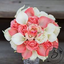 Tight bouquet of coral, orange and white roses and eucalyptus. Coral And Ivory Bouquet Artificial Flowers Calla Lilies In Coral And Ivory Roses In Flower Bouquet Wedding Calla Lilly Wedding Bouquet Calla Lillies Wedding