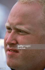 A close up of Bruce Wiggins of the Arizona Wildcats as he looks on... News  Photo