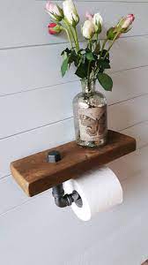 pin op toiletrol houder