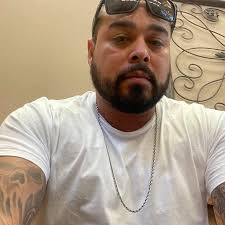 What could be causing my 2015 Chevy Tahoe to idle roughly and hesitate  while driving?