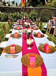 Do black favor boxes topped with a silk gerbera. Pin By Julie Cremata On Parties Styled By Me Bridal Shower Tables Orange And Pink Wedding Wedding Table Pink