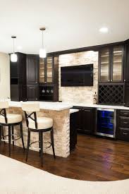 Basement Bar With Wood Flooring And Stone Wall Contemporary Home Bar Home Bar Designs Basement Remodeling Basement Design