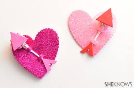 Slide the lollipop into the center hole of the flower and fold the heart shapes until they reach. Candy Valentine Crafts For Kids Sheknows