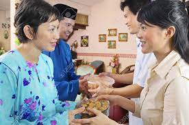 You're either cast away like tom hanks was and you have a volleyball for company or you live under a rock and you talk to the wall. Malay Couple Welcoming Guests On Hari Raya Open House Stock Photo Picture And Royalty Free Image Image 85738200