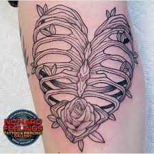 Black anchor with pink heart bow tattoo on girls back. Facebook
