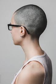 Despite shaved head women such as angelina jolie, halsey. Shaved Head Of An Androgynous Young Woman By Giorgio Magini Androgynous Hairstyle Stocksy United