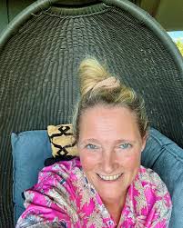 Here I am, in my brilliant pink PJ's, winding down from a beautiful day,  slightly shiny from my late afternoon sunblock after soaking in our  sunbathing pool in the garden! I'm happy