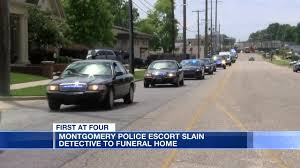 Montgomery Police Escort Slain Detective To Funeral Home