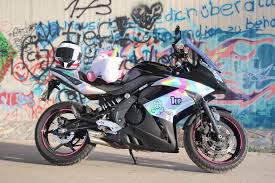 Black And Gold Motorcycle Wrap Pin On Vehicle