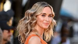 Emily Blunt's dazzling orange cut-out dress is bang