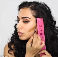 Image result for kim kardashian holding a ruler