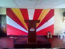 Create paper bouquets from metallic craft paper and weave throughout the church in the pews, at the altar and on the entranceway. Pin On Church Decoration