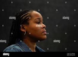 Bianca Palmer sheds a tear after speaking during a meeting of the Los  Angeles Police Department Board of Police Commissioners, Tuesday, Sept. 19,  2023, in Los Angeles. Palmer's sister, Jessica Brown, was