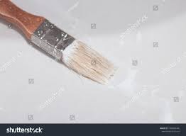 paint brush sink cleaning brush white