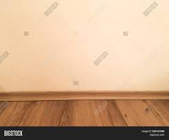 Empty room with black wood floor and white marble floor,perspective room. Room Wood Floor Image Photo Free Trial Bigstock