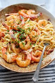 In a medium bowl, combine 1 tablespoon olive oil, shrimp, ¼ teaspoon salt, ½ teaspoon pepper, 1 tablespoon lemon zest and 2 tablespoons lemon. Garlic Butter Shrimp Pasta Craving Tasty