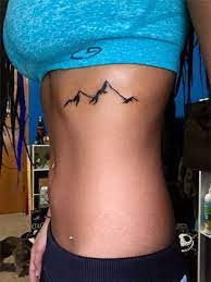 15 Top Rib Tattoo Ideen Um Fantastisch Auszusehen Mode Blog Rib Tattoo Mountain Tattoo Simple Tattoos