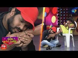 Ram Gopal Varma Touches The Feet Of Ashu Reddy