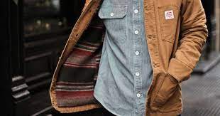 The 90s Spirit Of Carhartt Is Still Very Much Alive In Its New Soho Store Carhartt Jacket Menswear Mens Outfits