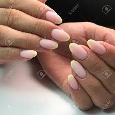 Gel nails vs acrylic nails in 2018. French Manicure On The Nails Manicure Gel Nail Polish Spa And Stock Photo Picture And Royalty Free Image Image 152466295