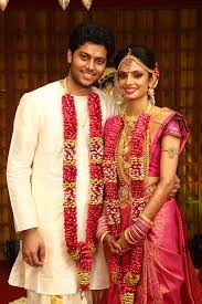 A Beautiful Picture Perfect Wedding Story Of Vinitha And Aneesh Indian Bridal Hairstyles Garland Wedding Indian Wedding