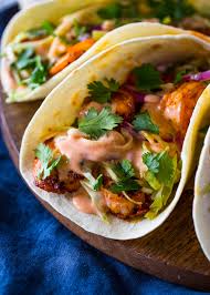 While the frozen fish fillets are baking, whisk together the fish taco sauce in a small bowl. Spicy Shrimp Tacos With Creamy Sriracha Sauce Cilantro Lime Slaw Gimme Delicious