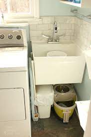 Possibly put in a door frame but no door if you don´t want to have a door between your. Hidden Storage Under A Laundry Room Sink