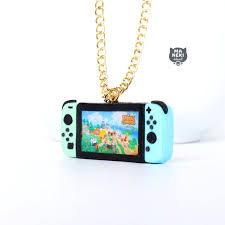 Nintendo Switch Animal Crossing New Horizons Console Necklace Etsy In 2021 Nintendo Switch Animal Crossing Handmade Polymer Clay Nintendo Switch