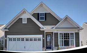 These exterior house trim ideas are real world examples, so you can get an example of how other stucco columns add style, character and definition without the costs normally associated with idea: Kaycan Vinyl Siding Castlemore Siding With Black Shutters White Shakes And Trims Rustic Urban Bold Vinyl Siding Exterior Siding Colors Vinyl Siding Colors