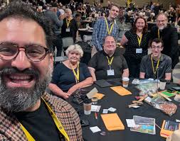 USS Crew is ready for day 4 of ELCA Churchwide Assembly 2025. Thank you  Vice President Imran Siddiqui for being our photographer.