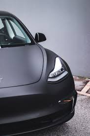 Tesla Model 3 Matte Black Vinyl Wrap In 2020 Tesla Model Vinyl Wrap Car Vinyl Wrap