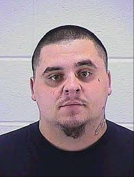 Aurora man first charged in suit against Latin Kings
