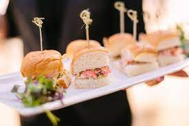 Is it customary for the guests to wait while the family photos are being taken before they eat or should we allow the guests to go ahead and eat while they wait on us? Wedding Reception Food How Many Hors D Oeuvre Per Person Do You