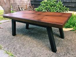 The tables have an intense birdseye, or a lacey wavey grain. Water Tank Redwood Coffee Table Ambrose Woodworks