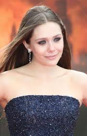 Godzilla actress Elizabeth Olsen shimmers in Elie Saab at the film's London  premiere