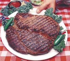 Serving of marinated rib eye steak with potatoes. Giant Steaks From Around The Country Biggest Steaks In The U S