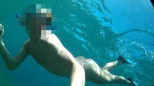 Nude diving and snorkeling in the sea