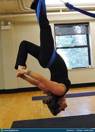 It involves traditional yoga poses with the added support of a strong, silky hammock that hangs from the ceiling. Aerial Yoga Pose Asana Image By Kierstenlinde