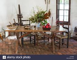 Large antique maple butcher block table. Wooden Chairs In Interior Of Colonial Style Stock Photo Alamy