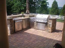 The size and shape of the island suit the size of the room and the pleasantly abstract end cap pulls all of. Grills Divine Landscaping Inc Outdoor Kitchen Outdoor Barbeque Built In Outdoor Grill