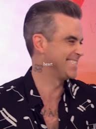 Robbie Williams and Ayda Field: A Romantic Moment