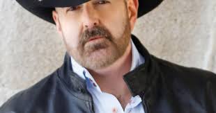 Country musician Drake Jensen performs in Cobourg Pride event