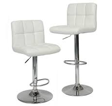 With effortless elegance, this pair of stools is upholstered in a soft ivory white offset by the black wooden frames. 35 Stylish Modern Adjustable White Leather Bar Stools Home Stratosphere