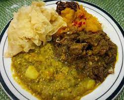 Trini Food Buss Up Shut Paratha Roti Curried Goat Baighan Aloo Eggplant Potato Pumpkin Spinach Bhaji Trini Food Food Curry Goat