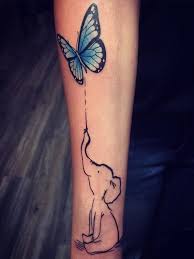 Learn about the story of elephant tats and symbolism. 40 Significant And Tiny Elephant Tattoo Designs