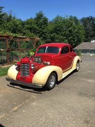 Image result for Mansion Maroon 1938 Oldsmobile