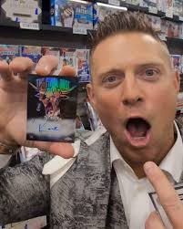 Topps have announced that one lucky collector has found the WWE Elimination  Chamber card signed by The Rock, John Cena & Travis Scott
